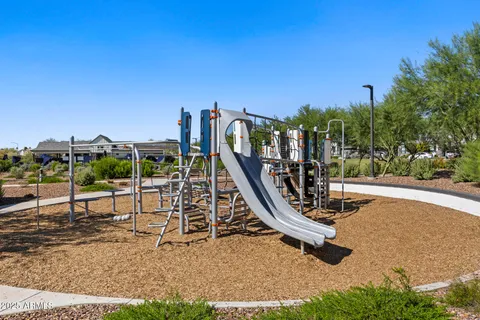 a view of a swimming pool with an outdoor space and seating area
