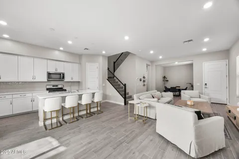 a view of livingroom with furniture and wooden floor