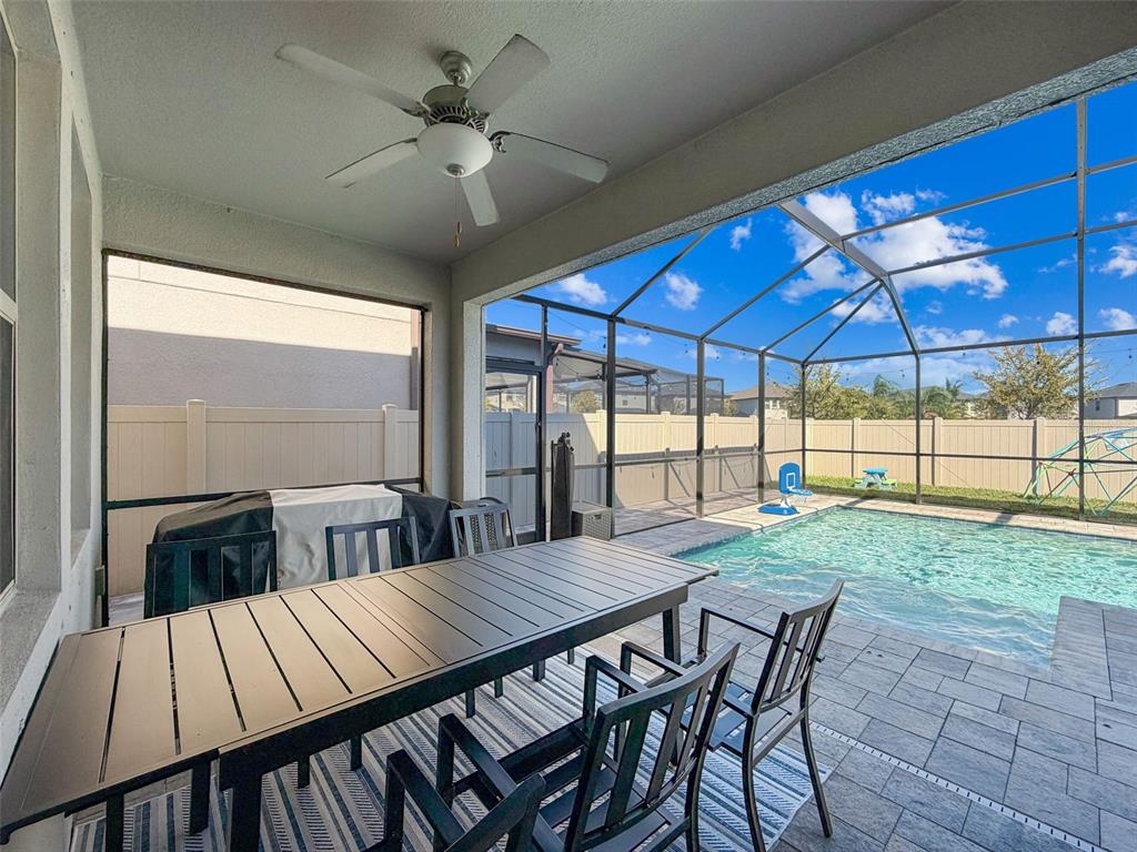 8124 Olympic Stone Circle Trinity, FL 34655 - Photo 26 of 75 a view of a dining room with furniture window and outside view