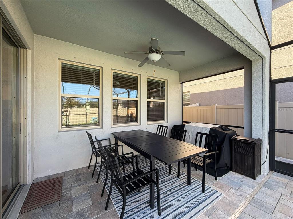 8124 Olympic Stone Circle Trinity, FL 34655 - Photo 27 of 75 a view of a dining room with furniture window and outside view