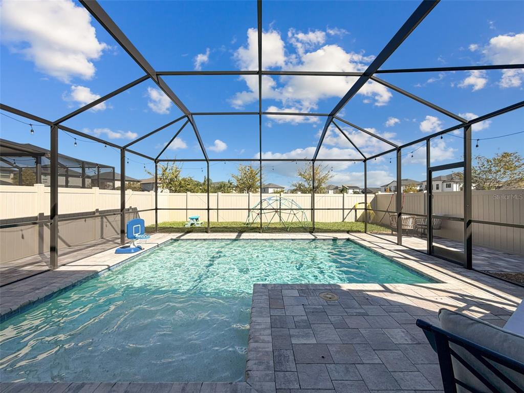 8124 Olympic Stone Circle Trinity, FL 34655 - Photo 30 of 75 a view of a backyard