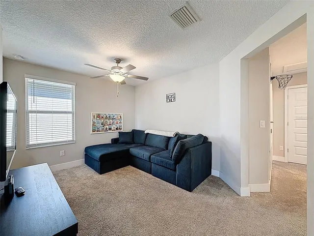 a bathroom with a sink a large mirror and a shower