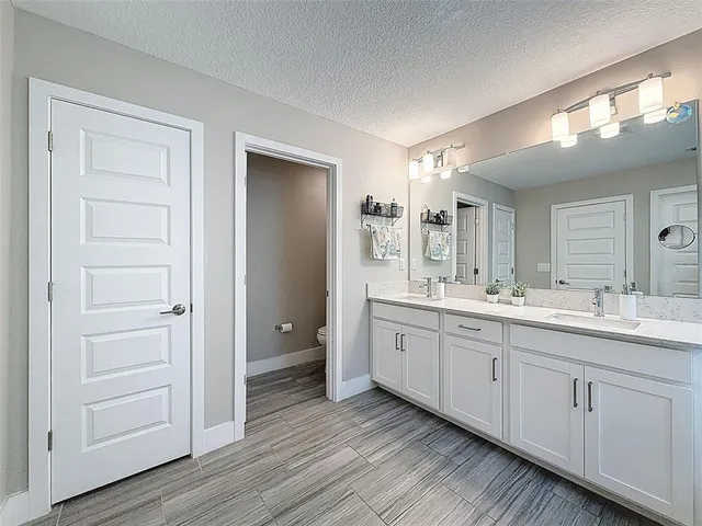 an aerial view of a house with a garden