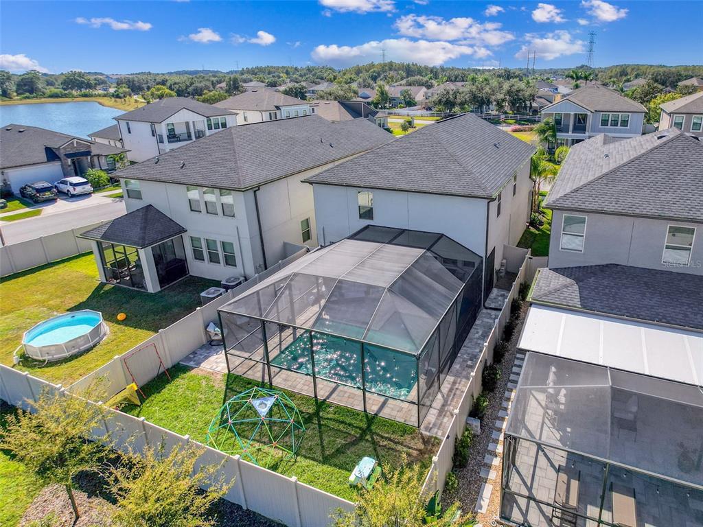 8124 Olympic Stone Circle Trinity, FL 34655 - Photo 5 of 75 an aerial view of a house with a big yard