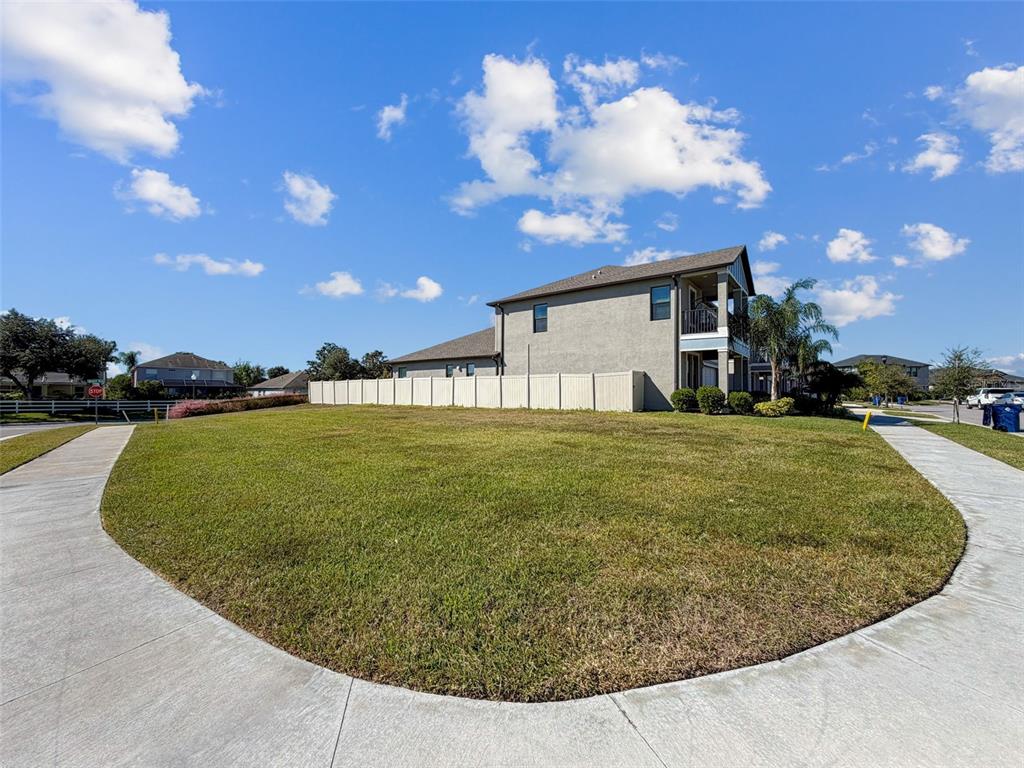 8124 Olympic Stone Circle Trinity, FL 34655 - Photo 70 of 75 a view of a house with a yard