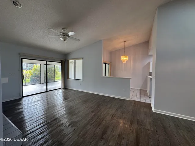 a bathroom with a shower and toilet