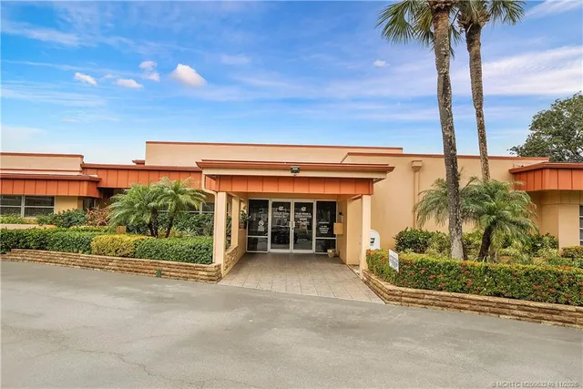 a view of a house with a garden