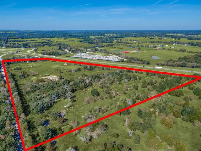 a view of an outdoor space with a swimming pool