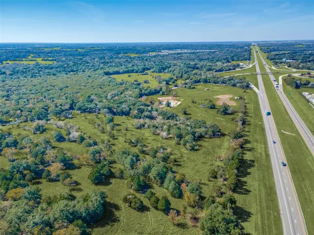 a view of a city with an ocean