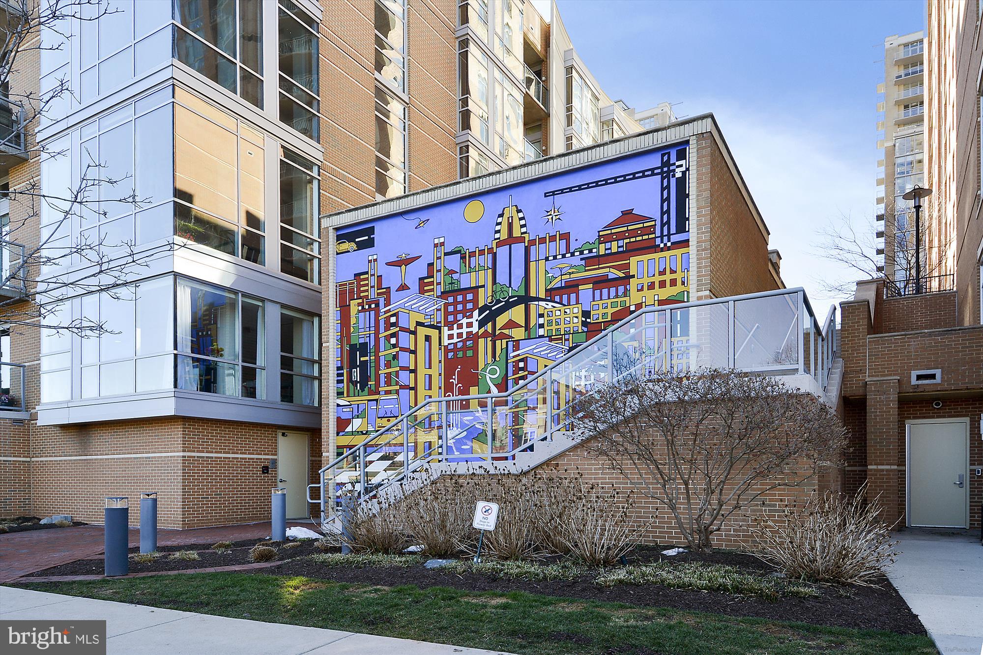 11200 Reston Station Boulevard, Unit 306 Reston, VA 20190 - Photo 29 of 53 a sign on the side of a building