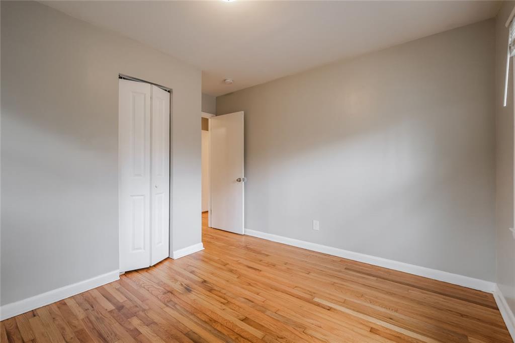 2965 Judylyn Drive Decatur, GA 30033 - Photo 15 of 26 a view of an empty room with wooden floor