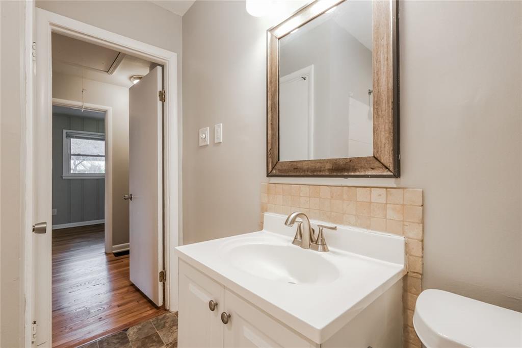 2965 Judylyn Drive Decatur, GA 30033 - Photo 20 of 26 a bathroom with a sink toilet and vanity