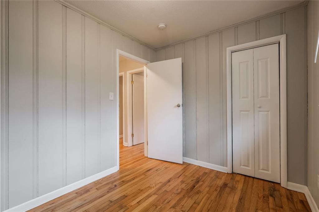 2965 Judylyn Drive Decatur, GA 30033 - Photo 23 of 26 a view of an empty room with wooden floor