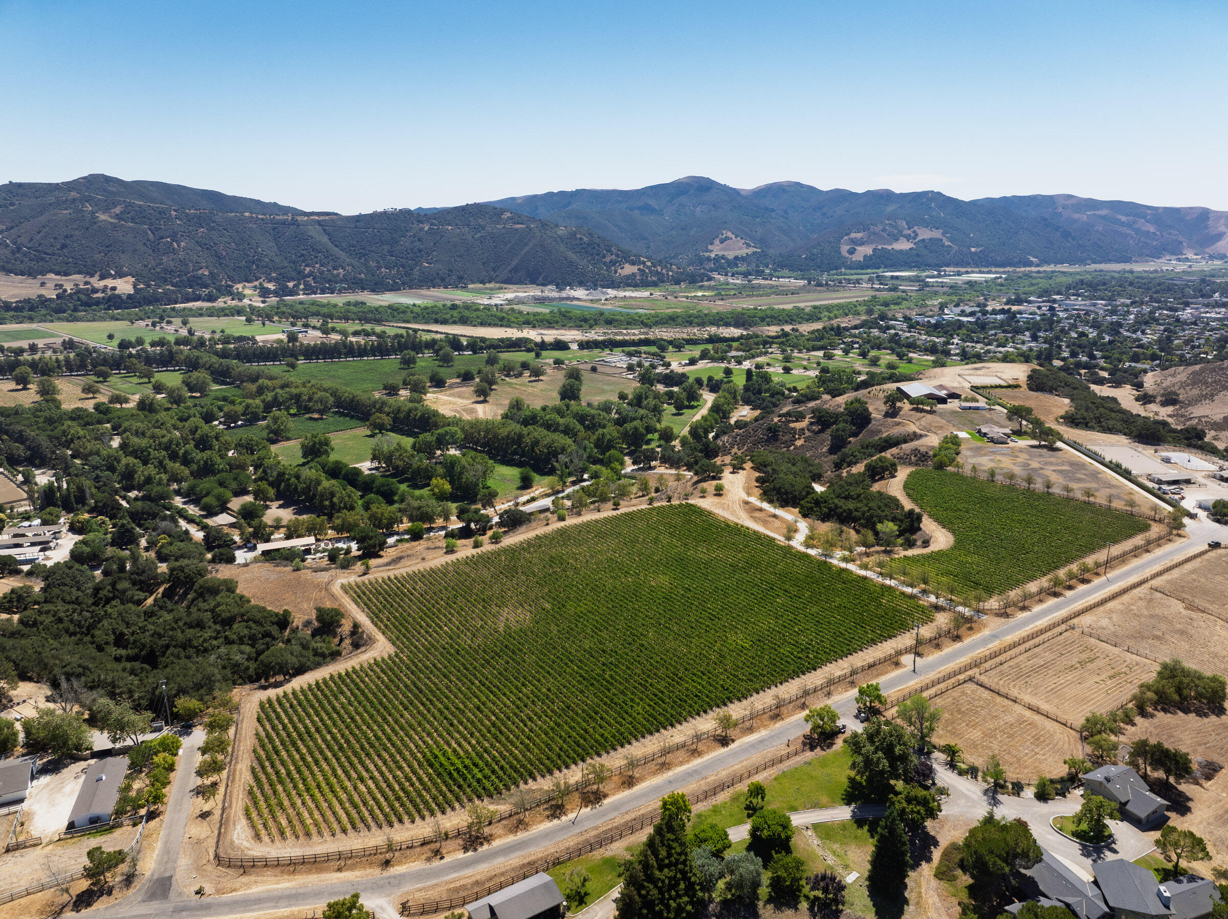 801 East Highway 246 Solvang, CA 93463 - Photo 22 of 41 a view of a city with mountains in front of it