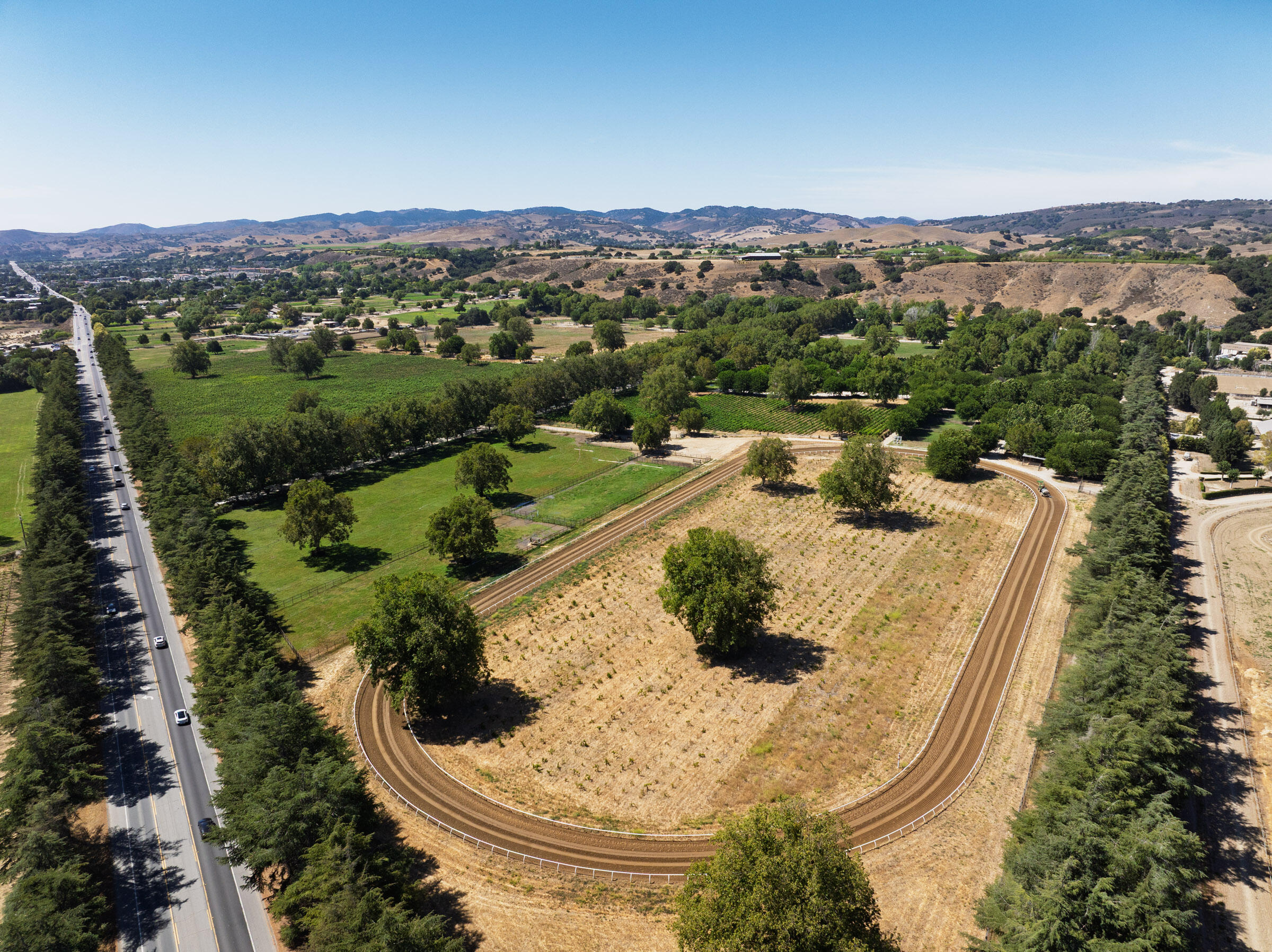 801 East Highway 246 Solvang, CA 93463 - Photo 5 of 41 an aerial view of a house with a yard and lake view