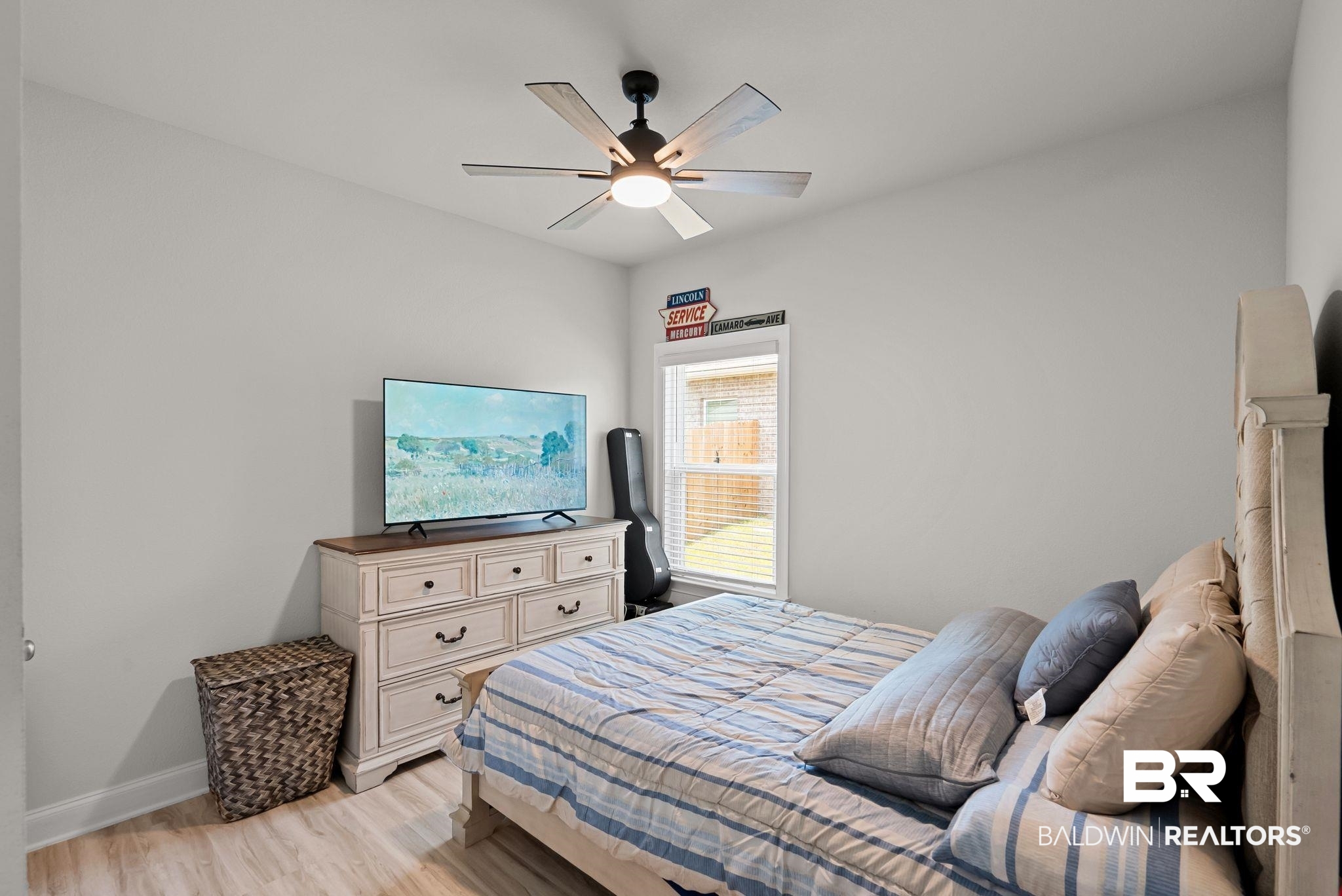 13966 Antler Hl Road Daphne, AL 36527 - Photo 23 of 44 Room with light wood-finish flooring, a window with blinds, and light-toned walls