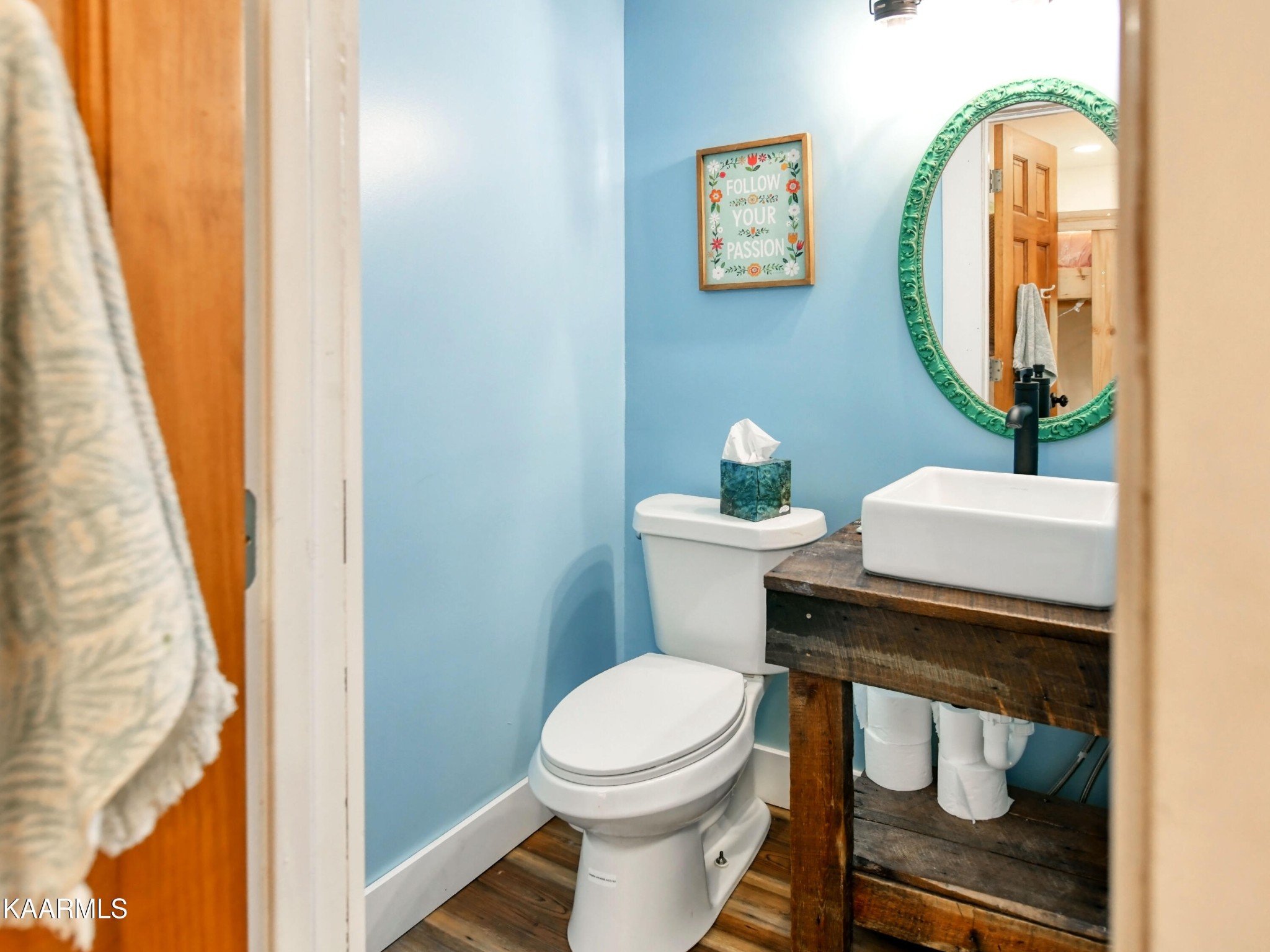 679 Blockhouse Valley Road Clinton, TN 37716 - Photo 23 of 45 a bathroom with a toilet sink and mirror