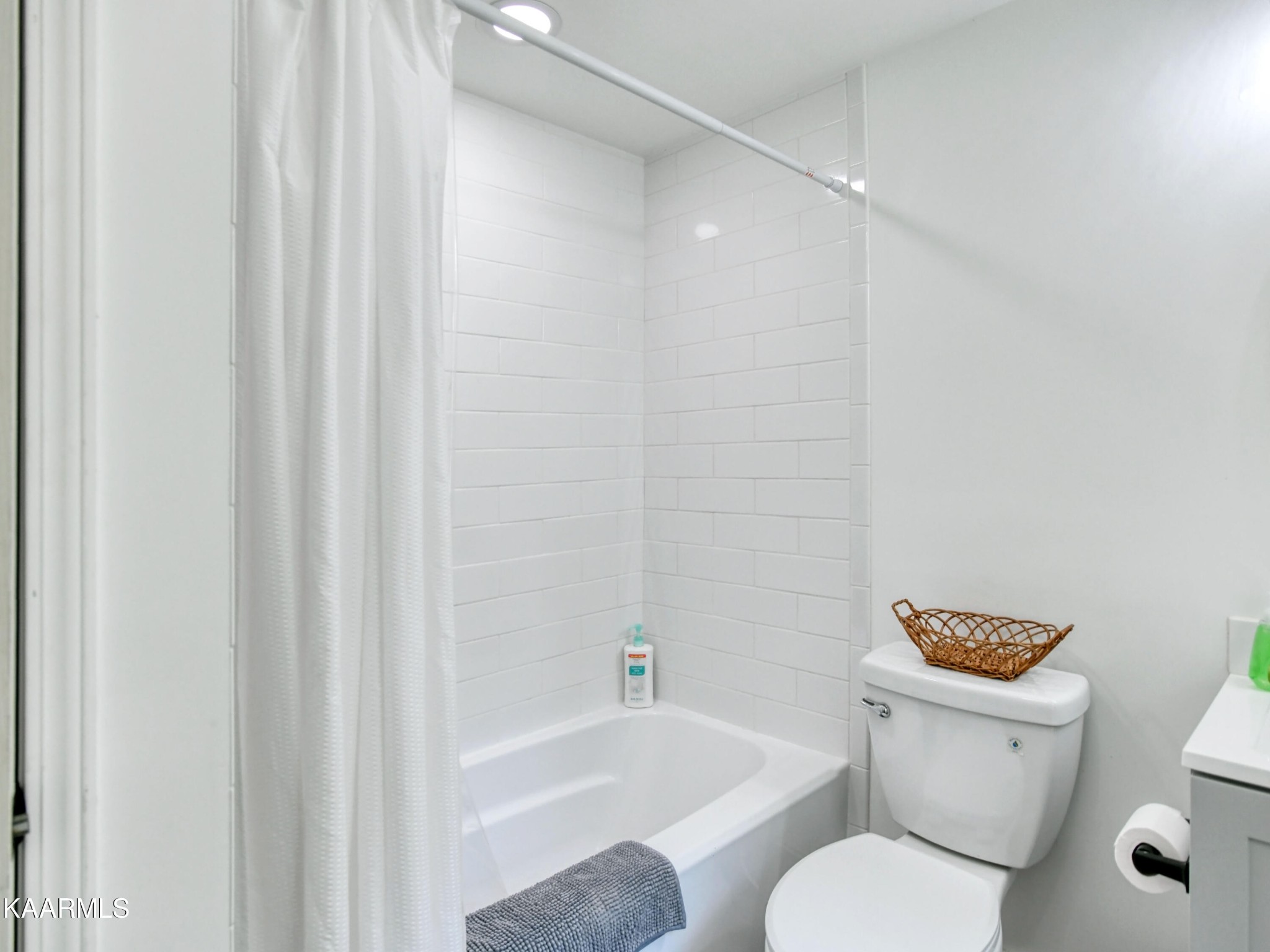 679 Blockhouse Valley Road Clinton, TN 37716 - Photo 29 of 45 a white toilet sitting next to a bath tub