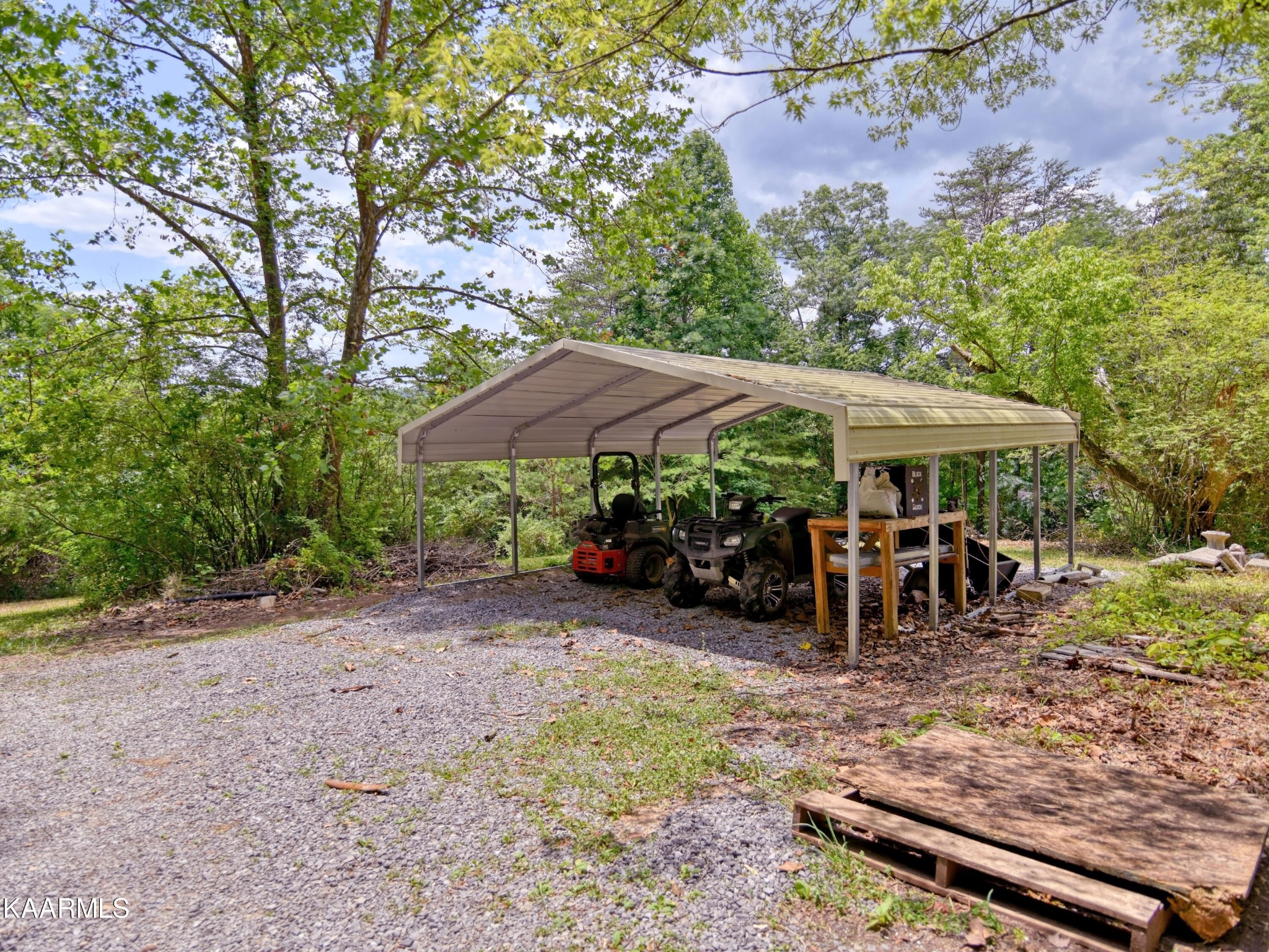 679 Blockhouse Valley Road Clinton, TN 37716 - Photo 33 of 45 an outdoor space with lots of trees