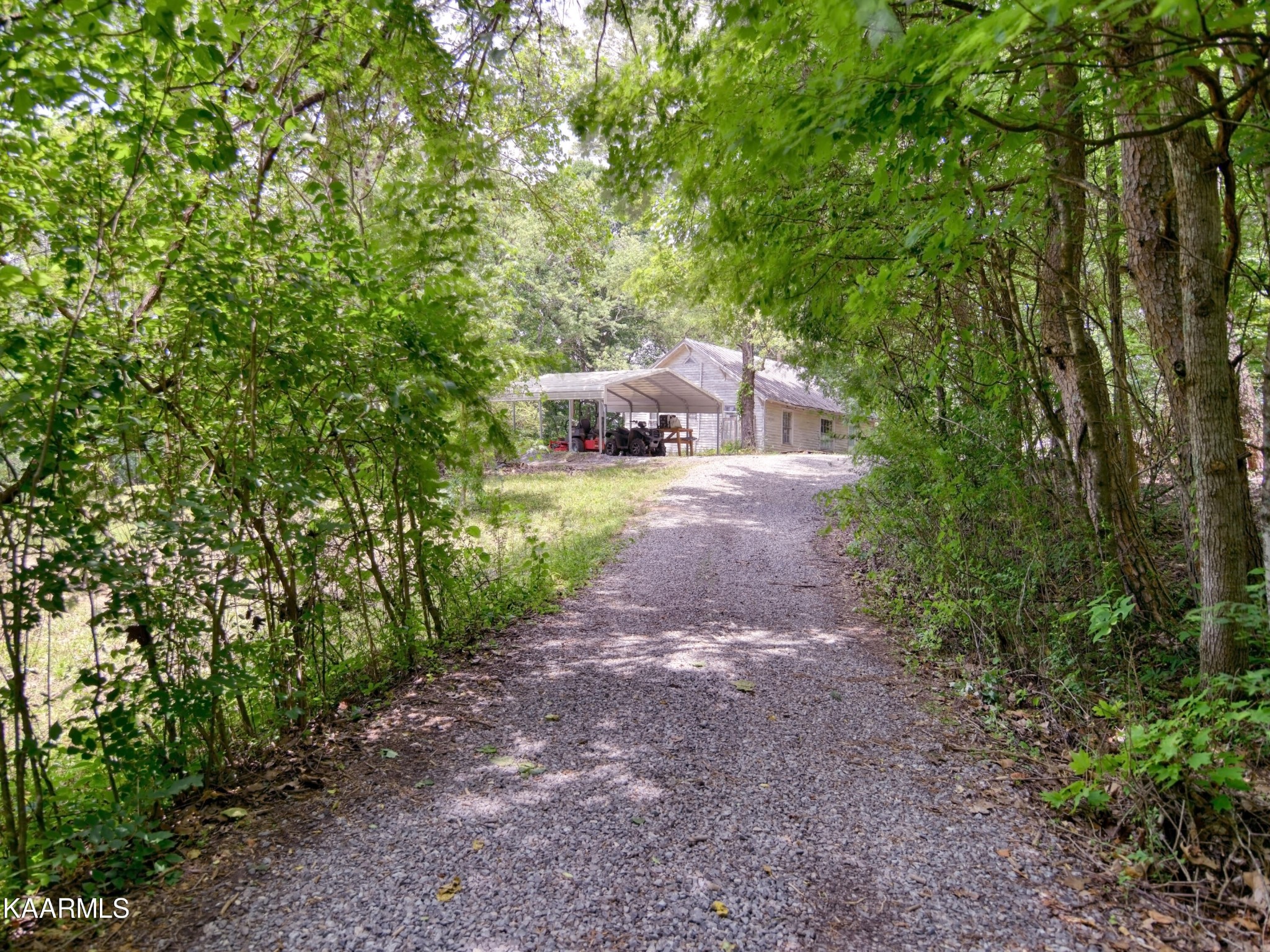 679 Blockhouse Valley Road Clinton, TN 37716 - Photo 34 of 45 a pathway of a house with a yard