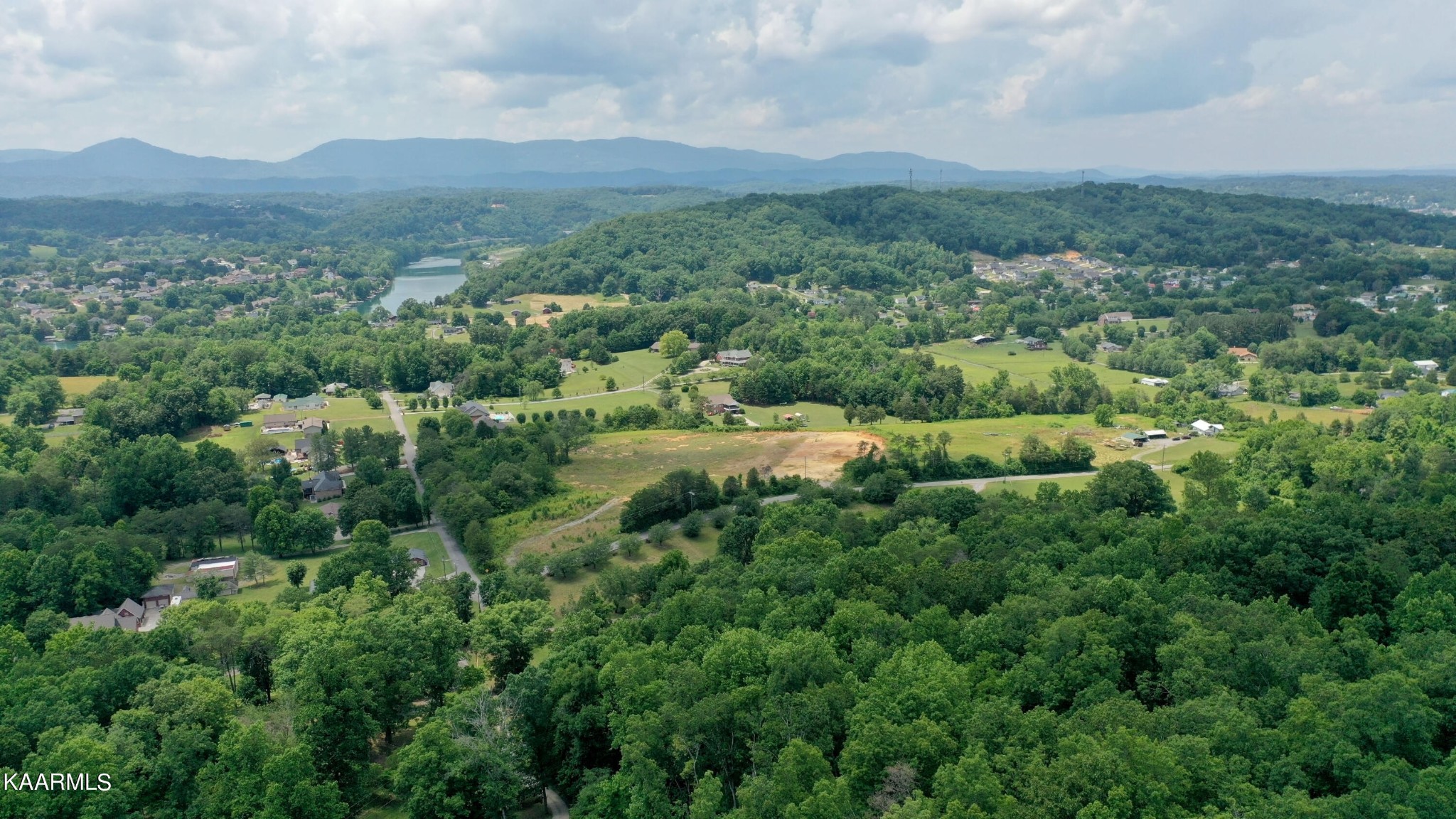 679 Blockhouse Valley Road Clinton, TN 37716 - Photo 41 of 45 an aerial view of residential house with outdoor space and trees all around