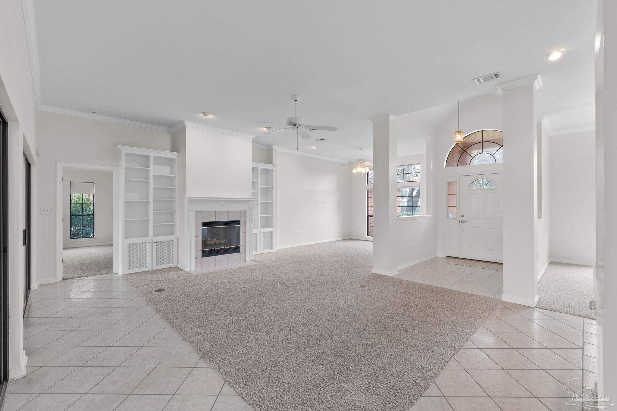 2640 Masters Boulevard Navarre, FL 32566 - Photo 4 of 40 a view of a livingroom with a fireplace
