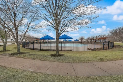 a view of a yard with a pathway