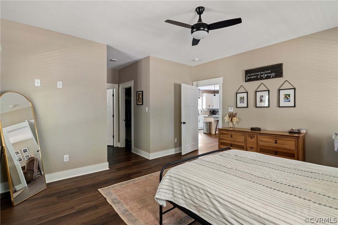 180 Goodwin Store Road Louisa, VA 23093 - Photo 16 of 27 a bedroom with a bed and wooden floor