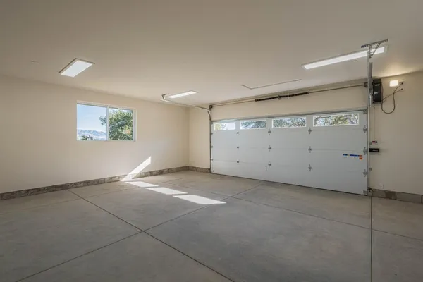 a bathroom with a mirror and a shower
