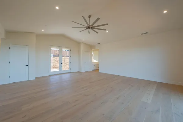 a view of an empty room and window