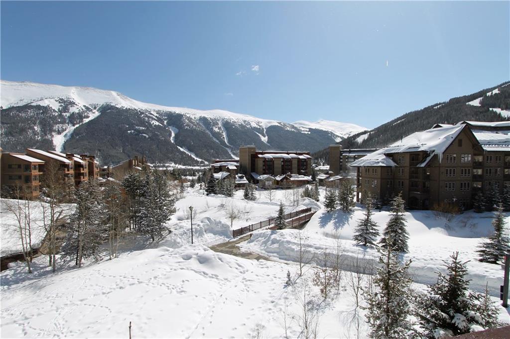 910 Copper Road, Unit 303 Copper Mountain, CO 80443 - Photo 11 of 26 a view of a backyard with snow on the road