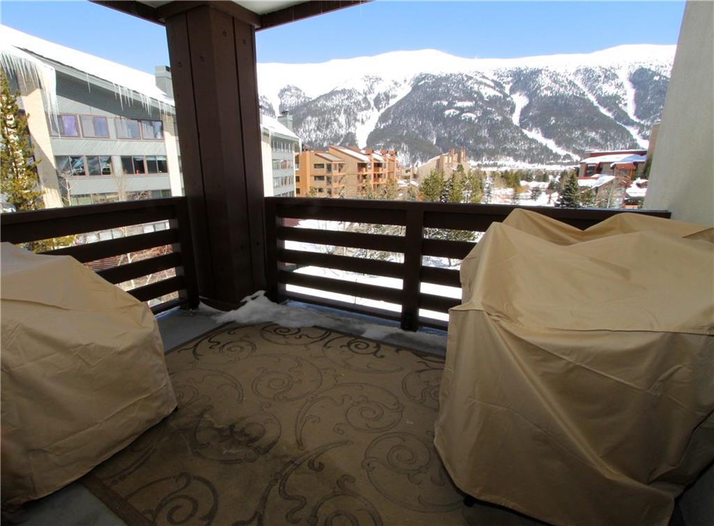 910 Copper Road, Unit 303 Copper Mountain, CO 80443 - Photo 10 of 26 a view of a balcony with chairs