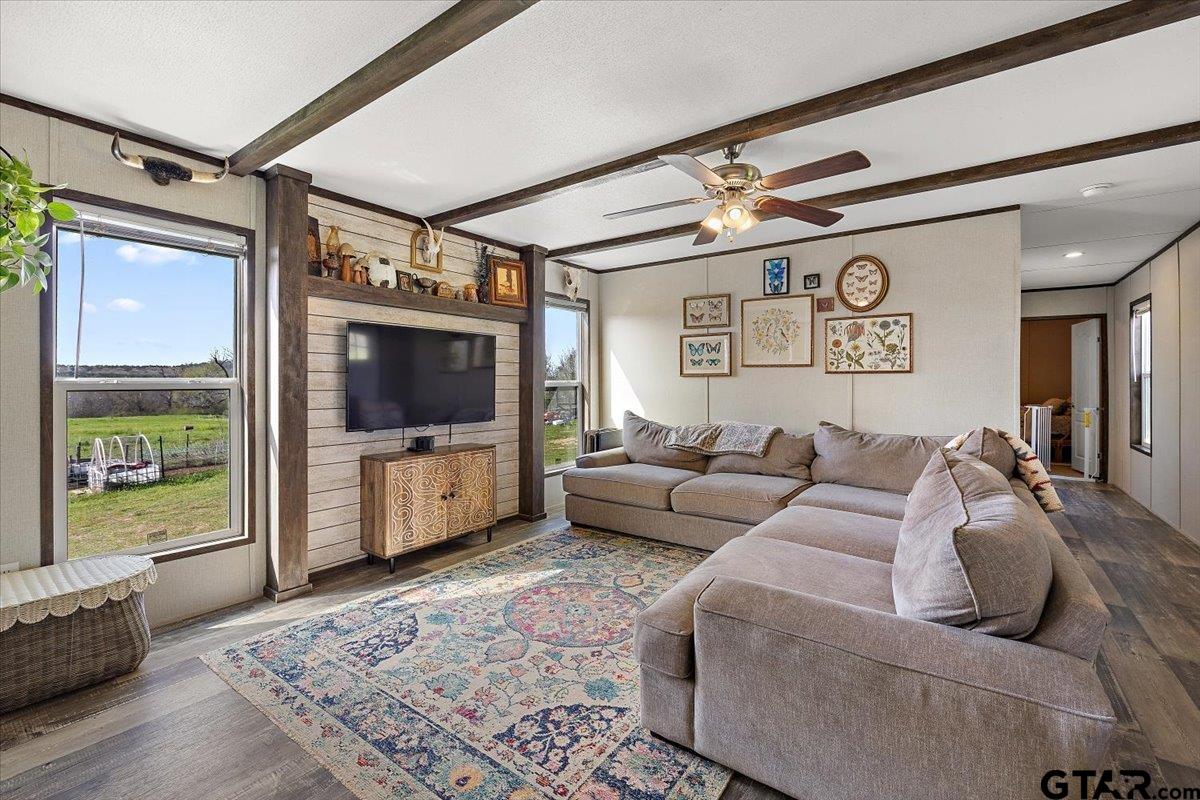 420 County Road 2201 Rusk, TX 75785 - Photo 9 of 41 a living room with furniture and a flat screen tv