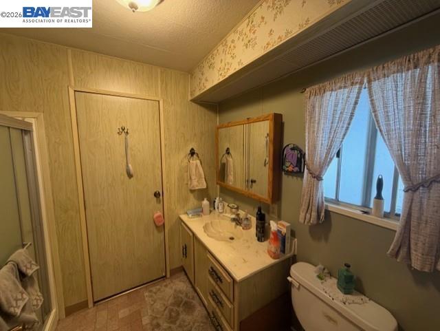 29266 Nantucket Way Hayward, CA 94544 - Photo 11 of 24 a bathroom with a sink a toilet and shower