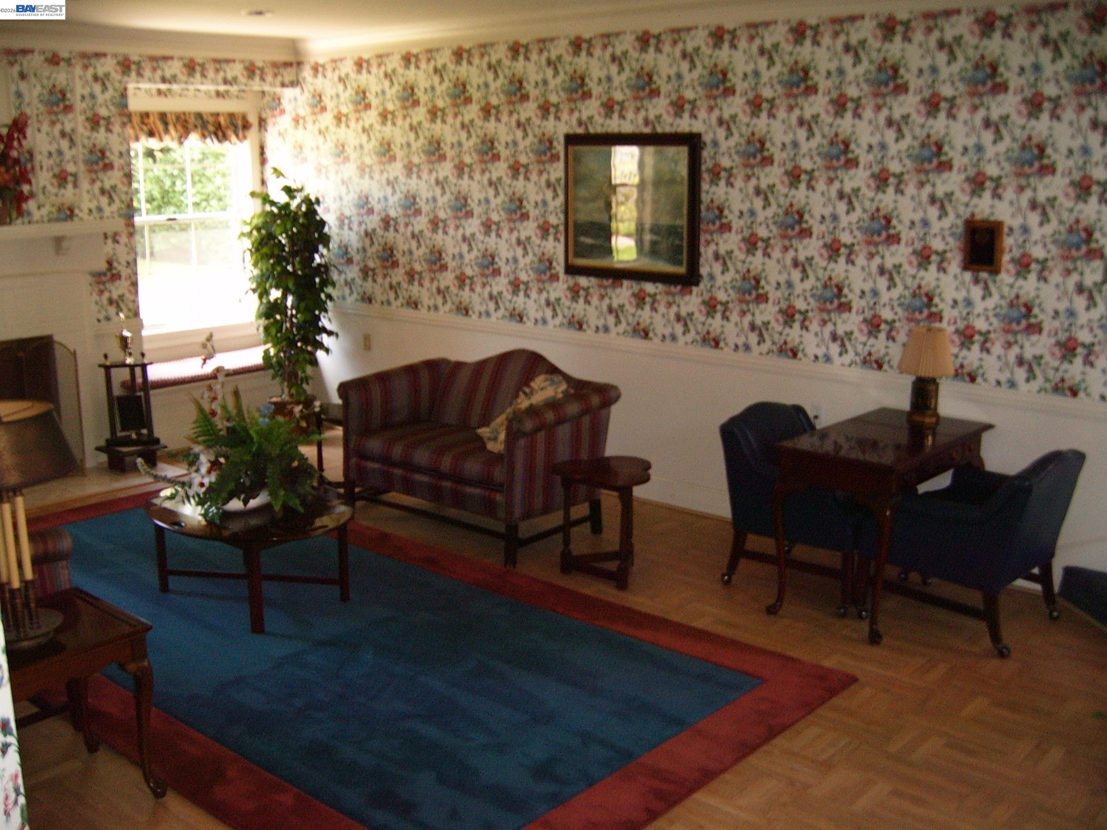 29266 Nantucket Way Hayward, CA 94544 - Photo 24 of 24 a living room with furniture wooden floor and a fireplace