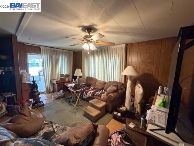 29266 Nantucket Way Hayward, CA 94544 - Photo 4 of 24 a living room with furniture a fireplace and a flat screen tv