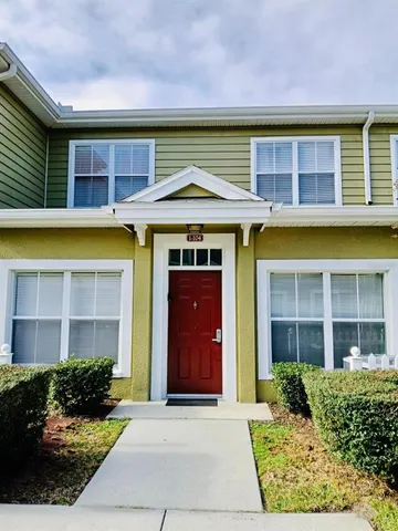 a front view of a house having yard