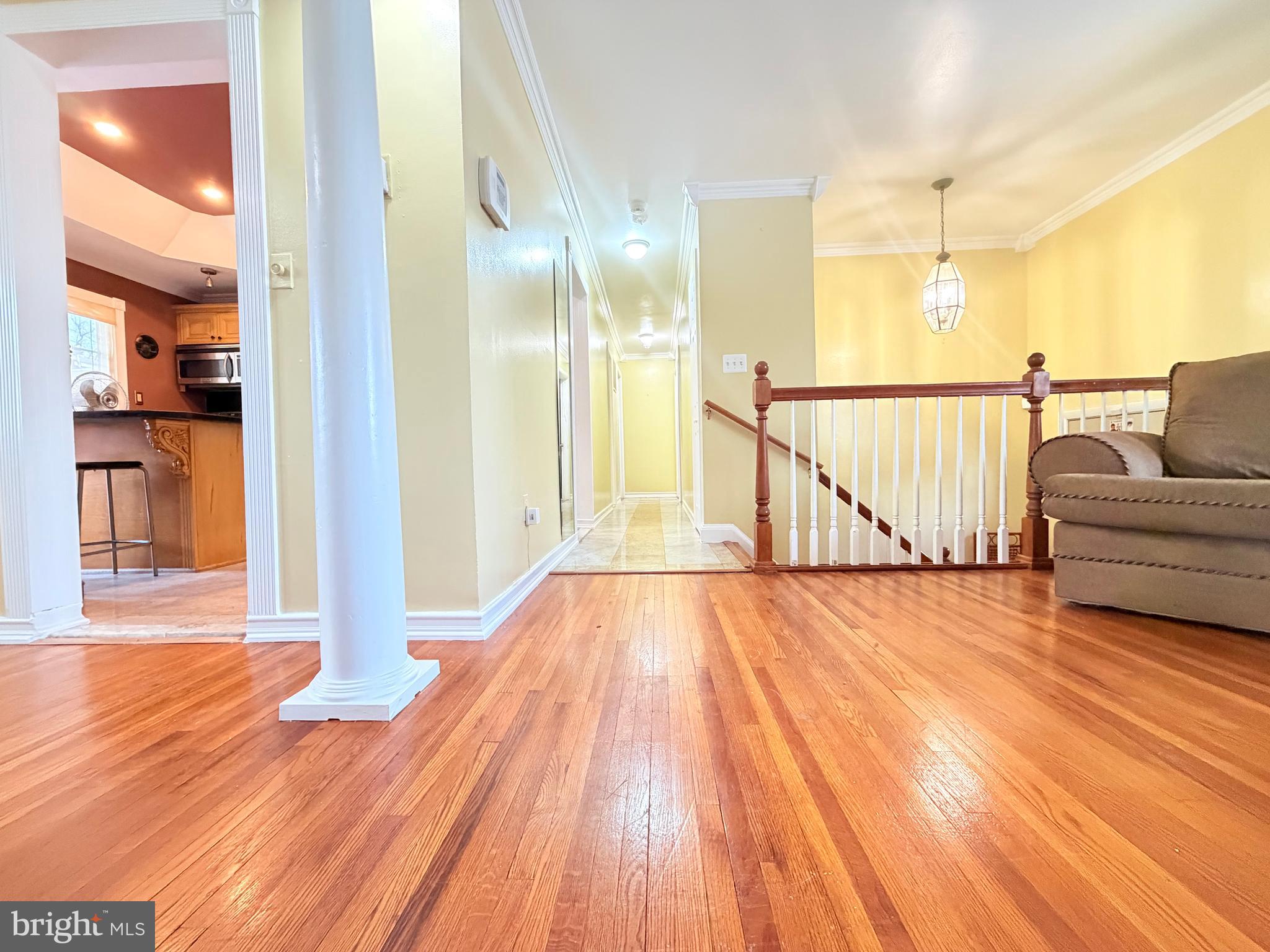 2003 Prichard Road Silver Spring, MD 20902 - Photo 12 of 45 a view of a room with wooden floor and windows