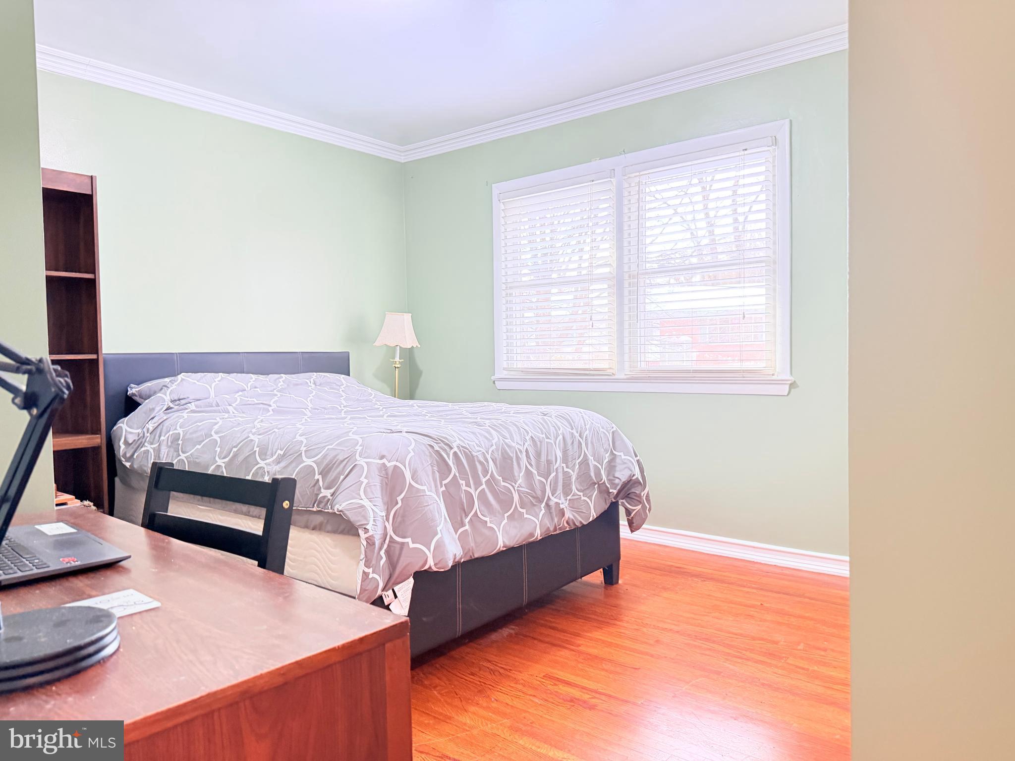 2003 Prichard Road Silver Spring, MD 20902 - Photo 23 of 45 a bedroom with a bed and window