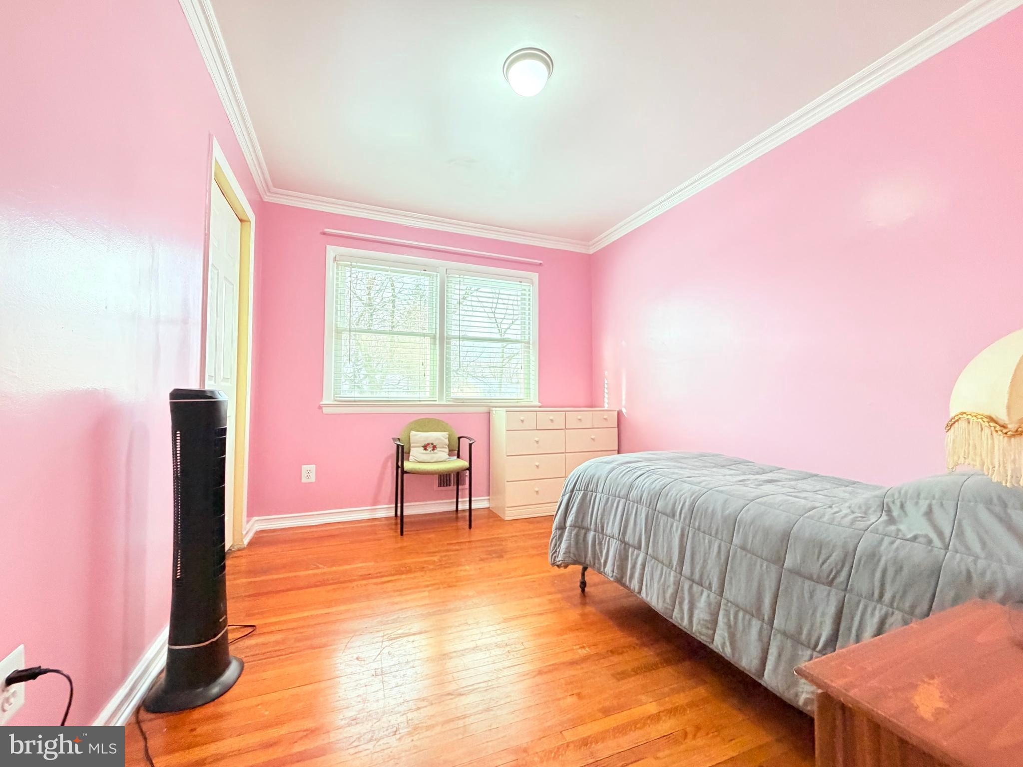 2003 Prichard Road Silver Spring, MD 20902 - Photo 25 of 45 a bedroom with a bed and a table