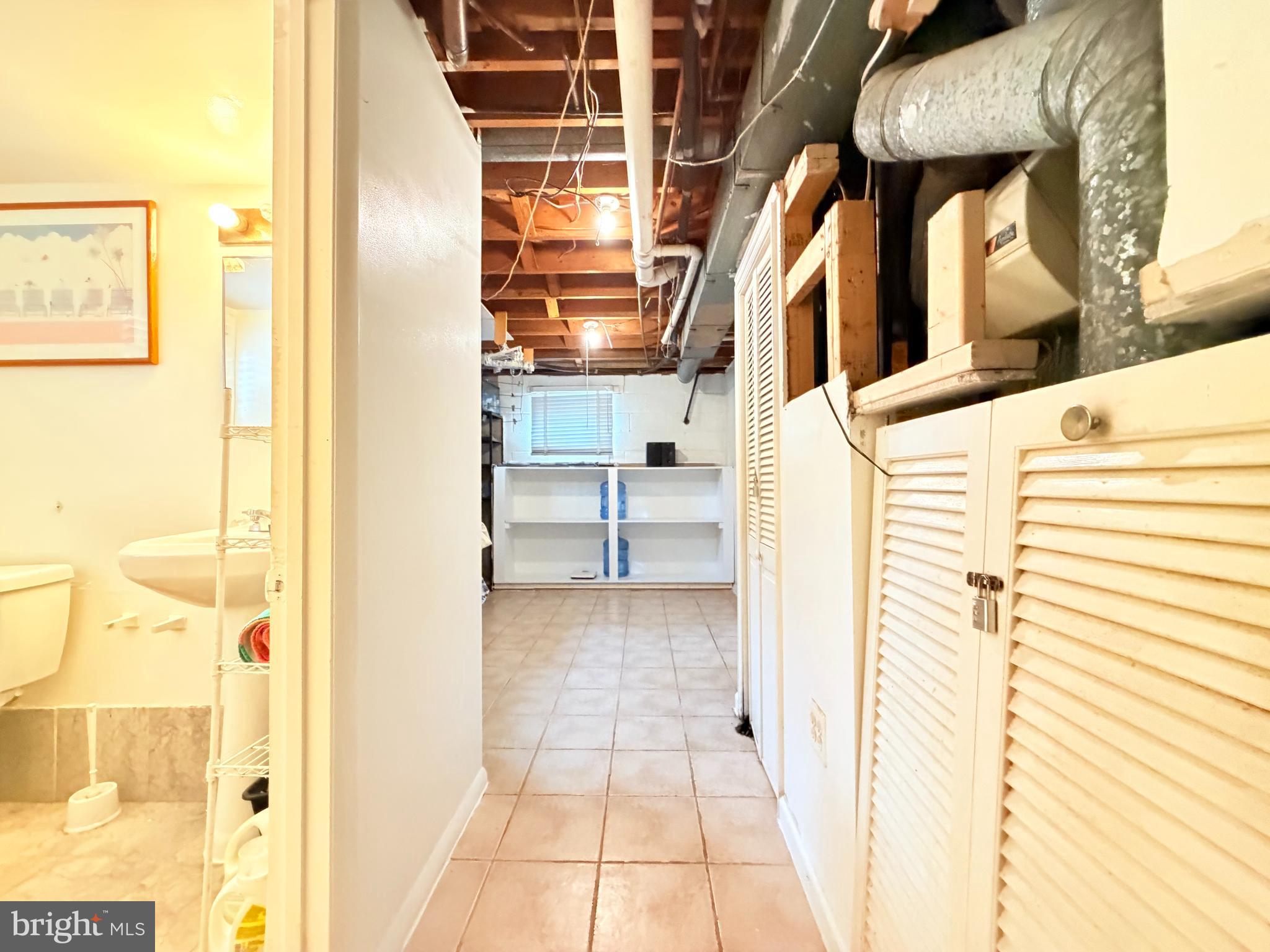 2003 Prichard Road Silver Spring, MD 20902 - Photo 36 of 45 a view of a bathroom with a tub and shower