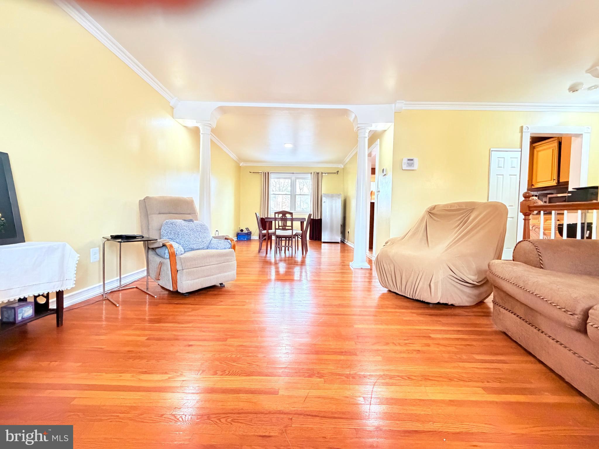 2003 Prichard Road Silver Spring, MD 20902 - Photo 5 of 45 a spacious bedroom with a bed and a couch