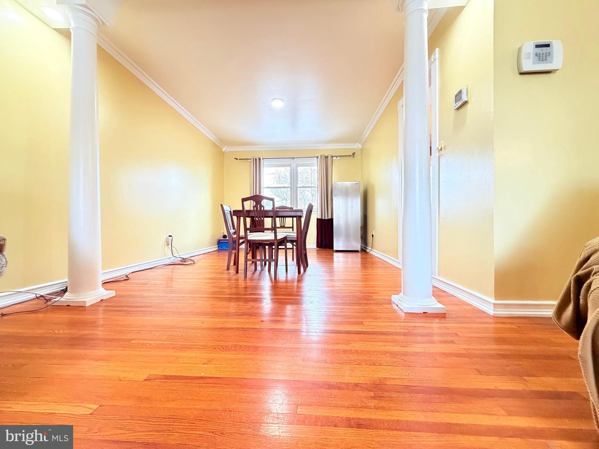 2003 Prichard Road Silver Spring, MD 20902 - Photo 6 of 45 a view of a dining room with furniture and wooden floor