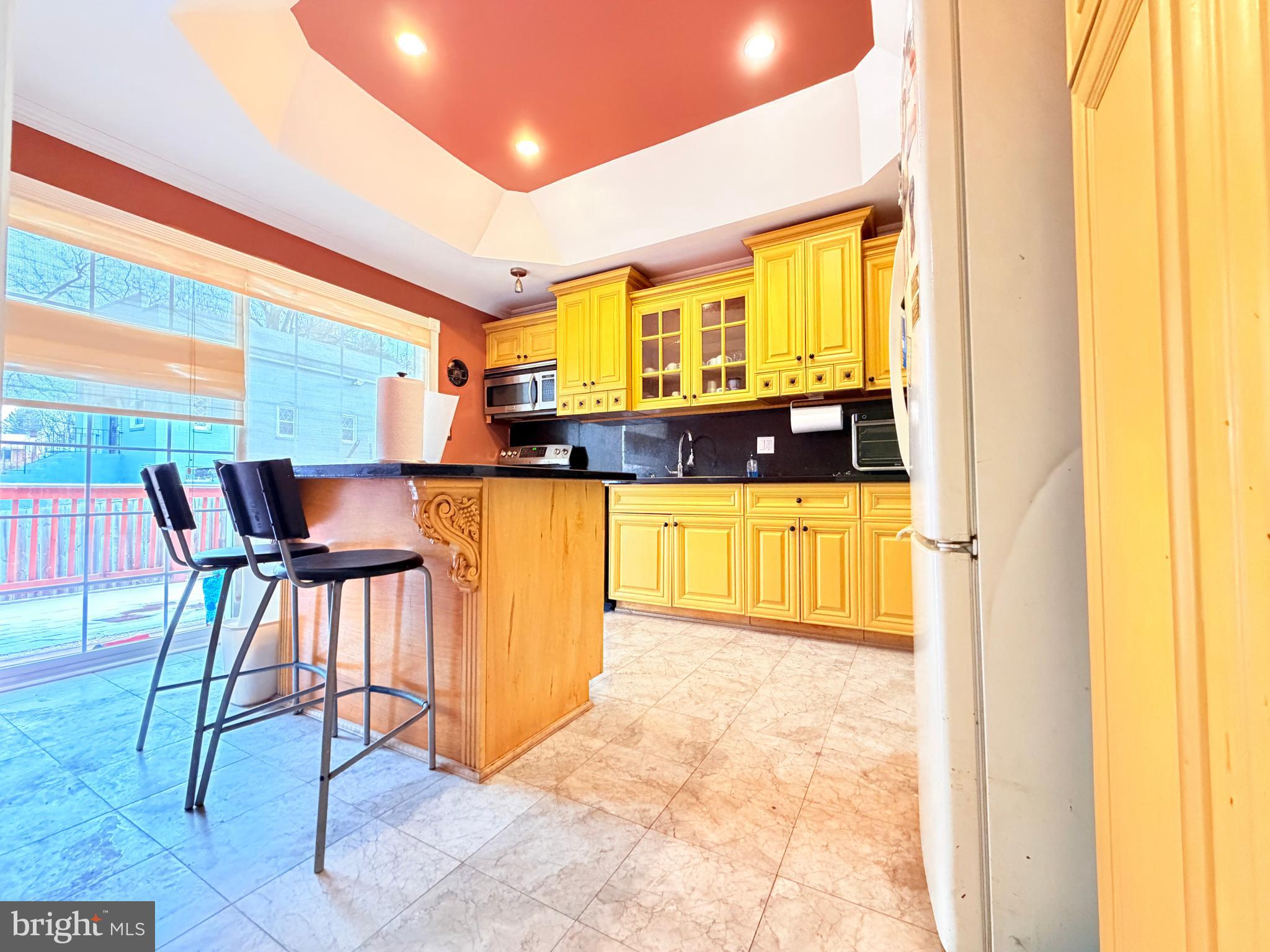 2003 Prichard Road Silver Spring, MD 20902 - Photo 9 of 45 a view of a kitchen and dining room
