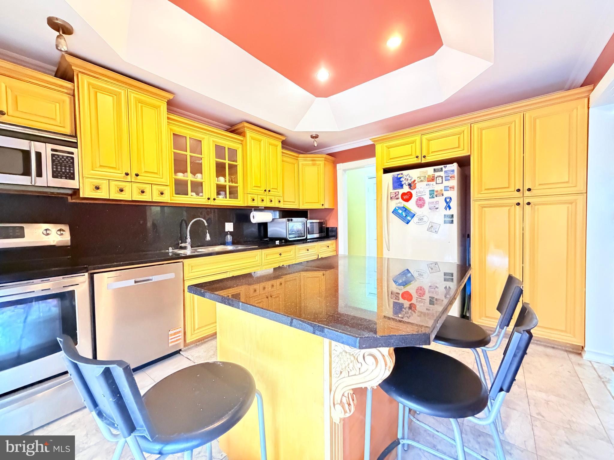 2003 Prichard Road Silver Spring, MD 20902 - Photo 10 of 45 a view of a dining room with furniture and a window