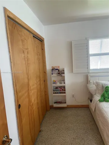 a bathroom with a shower and a tub