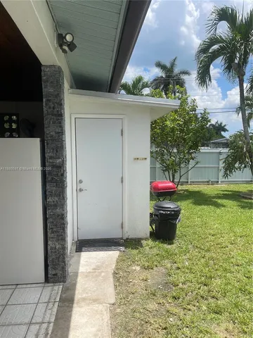 a view of a backyard of a house