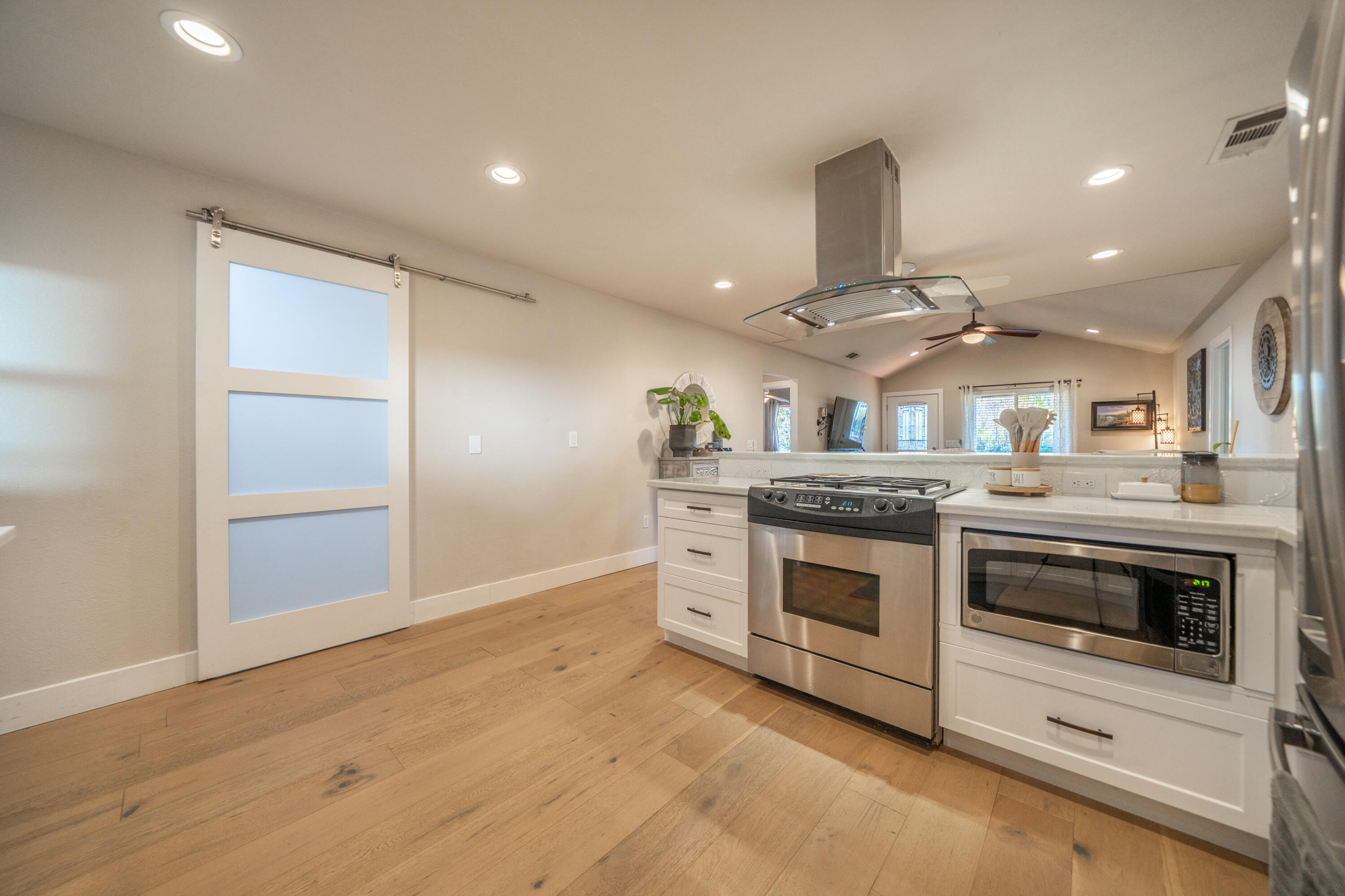 2385 Alexander Avenue Anderson, CA 96007 - Photo 15 of 72 a kitchen with stainless steel appliances granite countertop a stove and a refrigerator