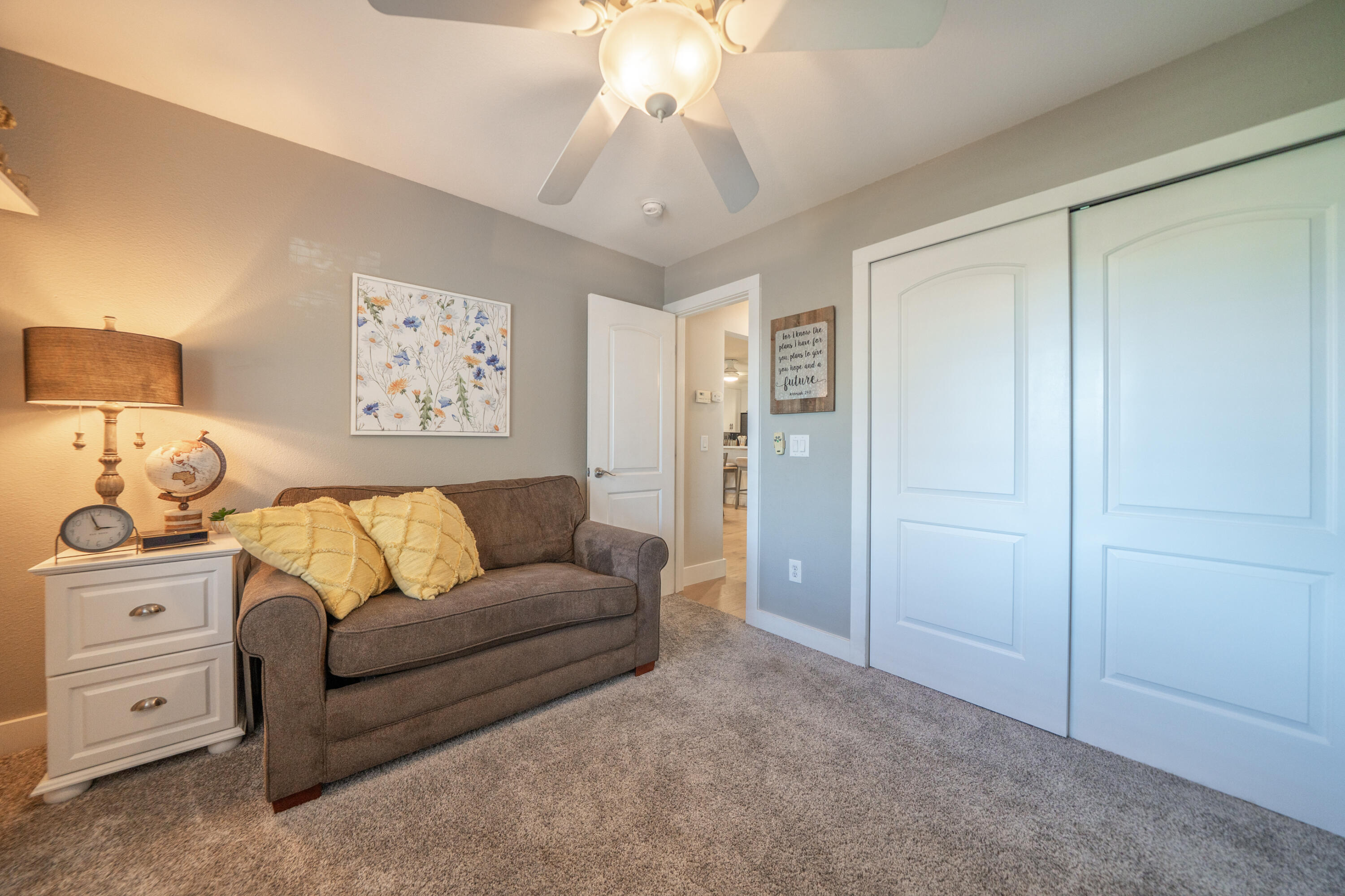 2385 Alexander Avenue Anderson, CA 96007 - Photo 18 of 72 a living room with furniture and a lamp