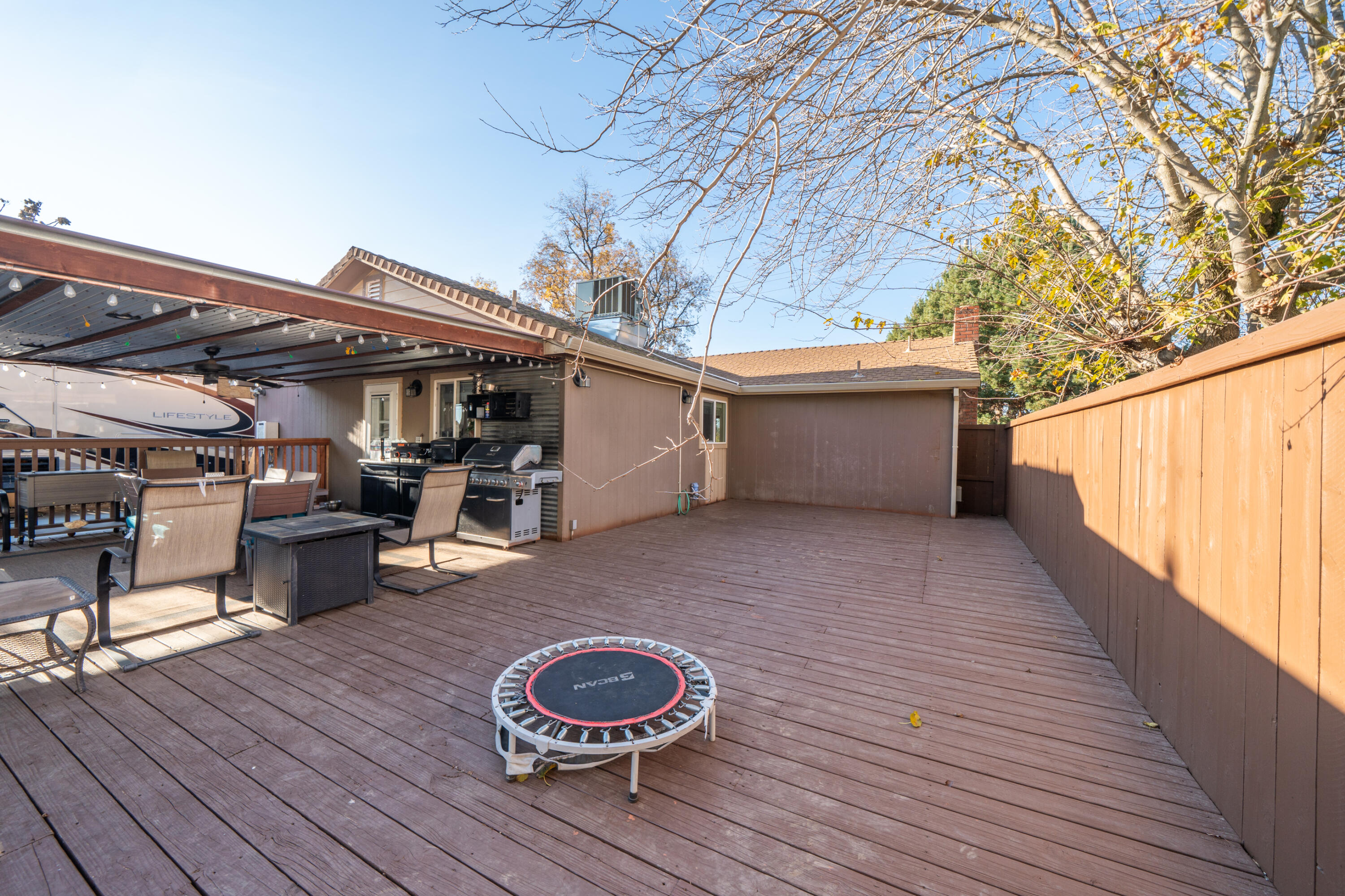 2385 Alexander Avenue Anderson, CA 96007 - Photo 38 of 72 a view of a chairs and table on the wooden floor